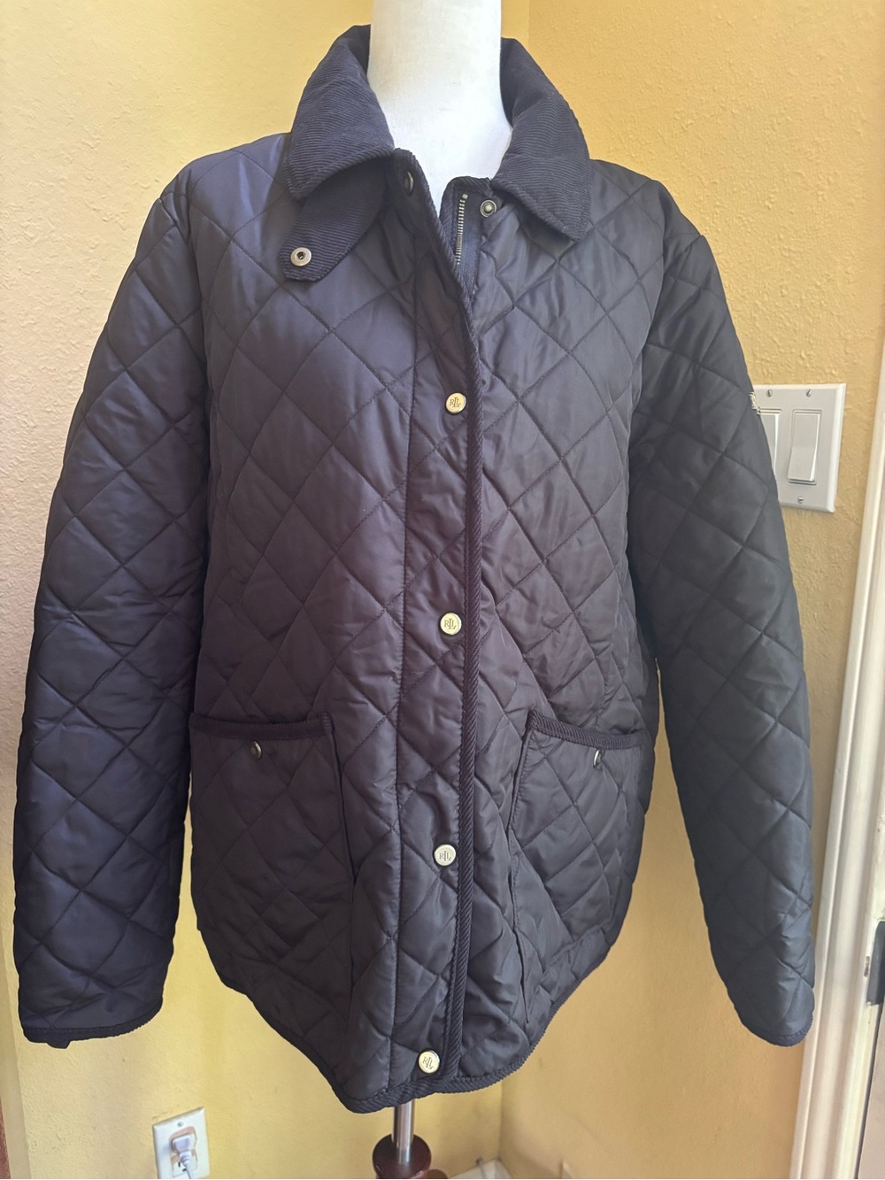 Ralph Lauren  Quilted Black jacket with equestrian themed lining. XL